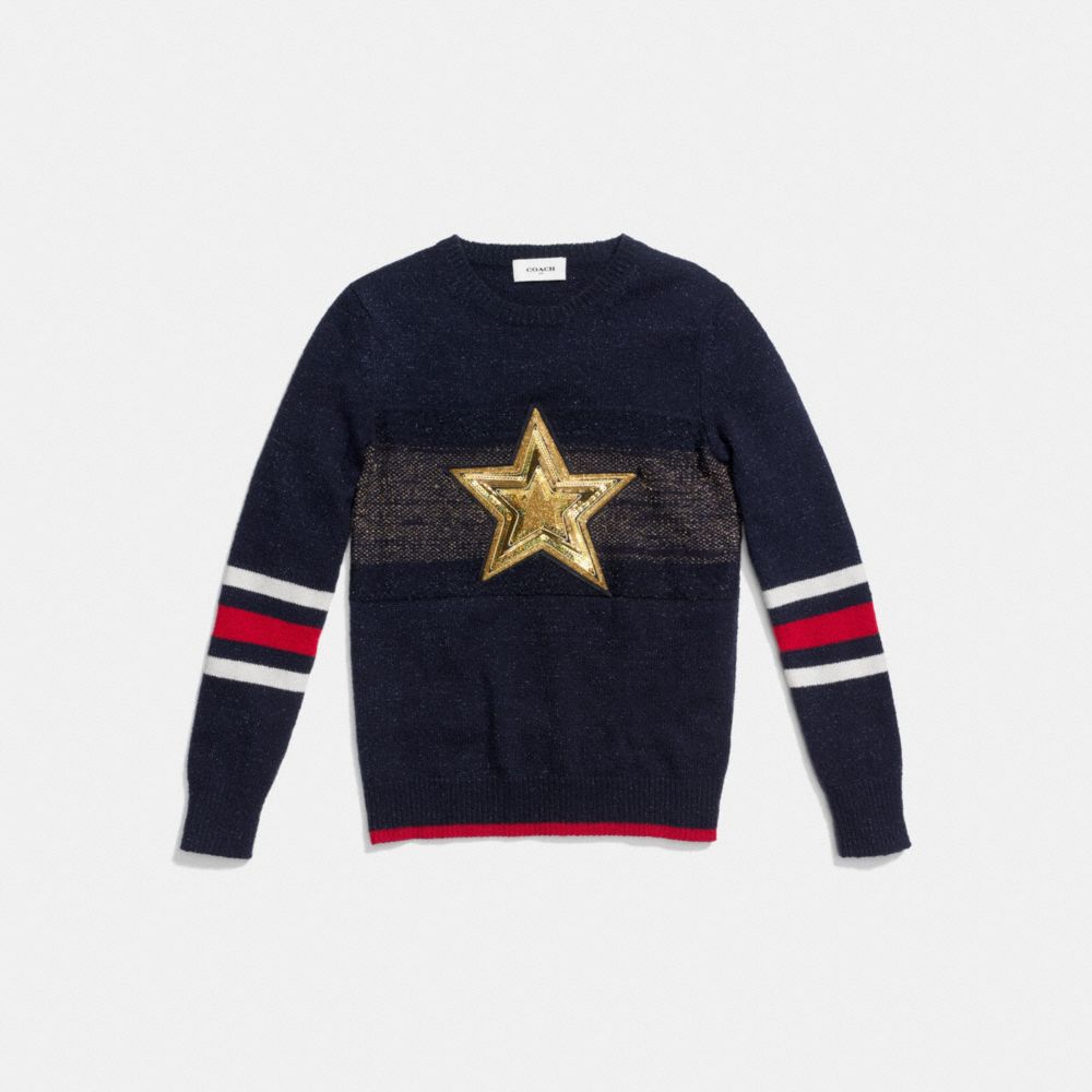 Pull ras du cou étoile scintillante en laine