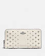 COACH®,ACCORDION ZIP WALLET IN POLISHED PEBBLE LEATHER WITH OMBRE RIVETS,Leather,Silver/Chalk,Front View