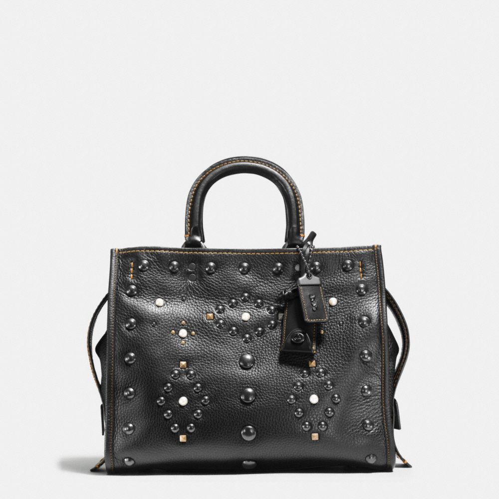 Coach rogue with rivets sale