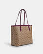 COACH®,CITY TOTE BAG IN SIGNATURE CANVAS,pvc,X-Large,Everyday,Gold/Khaki/Deep Berry,Angle View