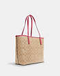 COACH®,CITY TOTE IN SIGNATURE CANVAS,pvc,X-Large,Everyday,Gold/Light Khaki/Confetti Pink,Angle View