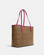 COACH®,CITY TOTE BAG IN SIGNATURE CANVAS,pvc,X-Large,Everyday,Gold/Khaki/Bold Pink,Angle View