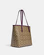 COACH®,CITY TOTE BAG IN SIGNATURE CANVAS,pvc,X-Large,Everyday,Im/Khaki/Boysenberry,Angle View