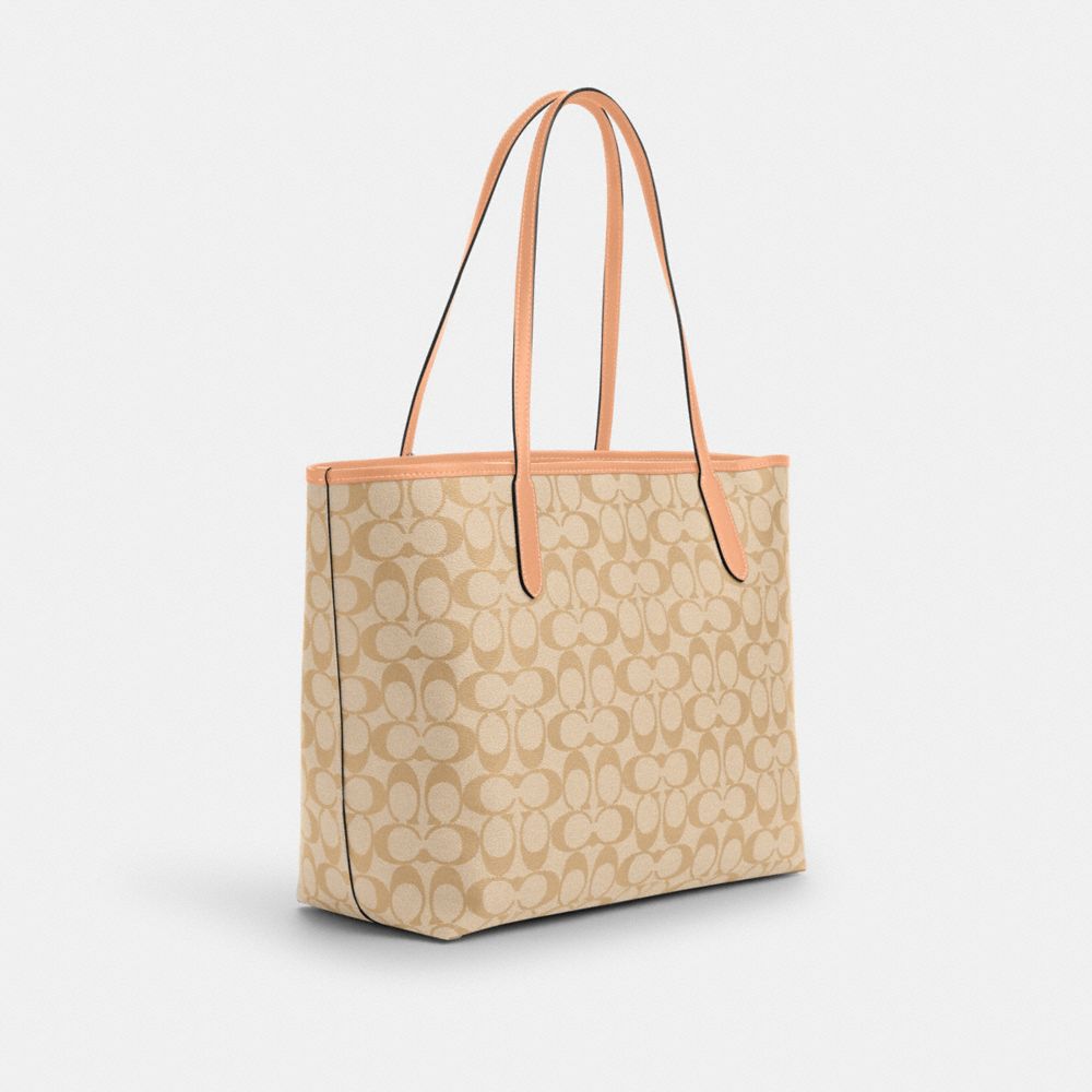COACH®,CITY TOTE BAG IN SIGNATURE CANVAS,Signature Canvas,X-Large,Everyday,Sv/Light Khaki/Faded Blush,Angle View