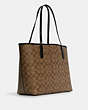 COACH®,CITY TOTE IN SIGNATURE CANVAS WITH HALLOWEEN,Signature Coated Canvas/Smooth Leather,X-Large,Gold/Khaki Multi Black,Angle View