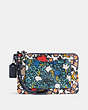 Small Wristlet In Mixed Yankee Floral Print Coated Canvas
