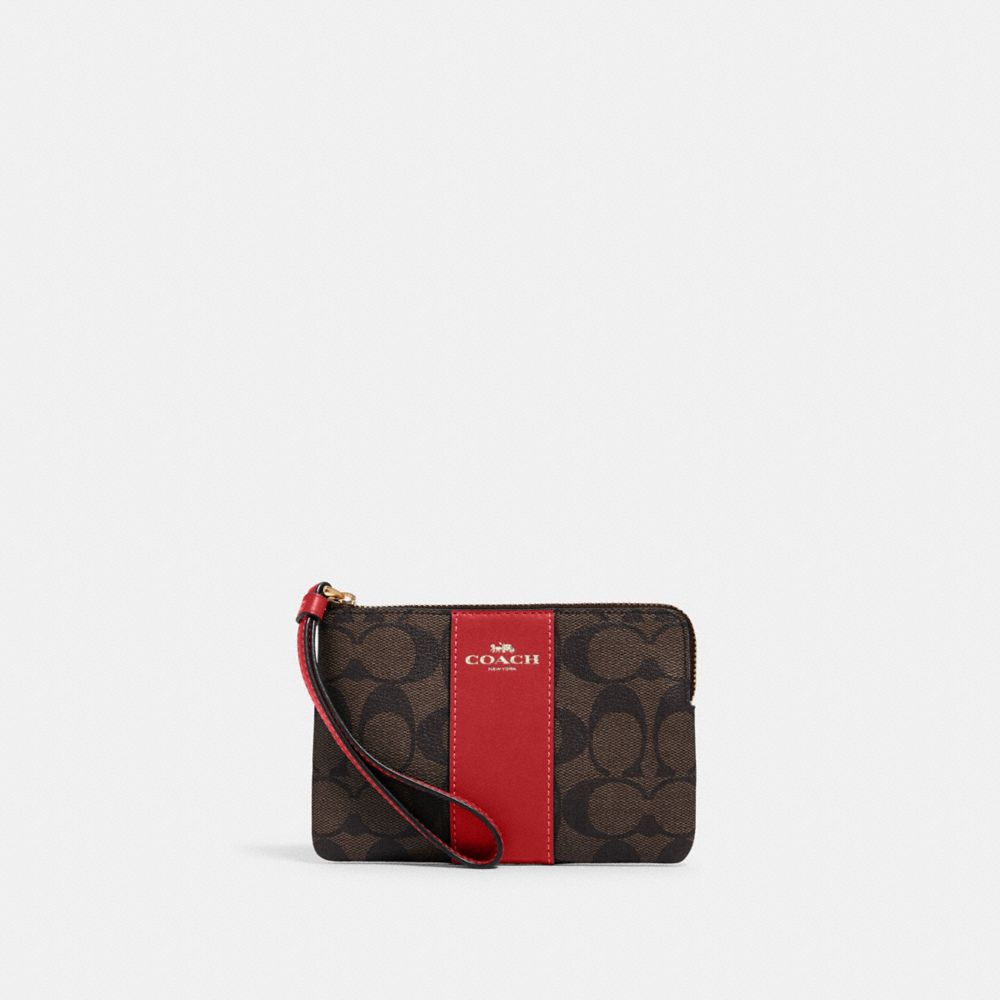 COACH®,CORNER ZIP WRISTLET IN SIGNATURE CANVAS,Signature Canvas,Gold/Brown 1941 Red,Front View