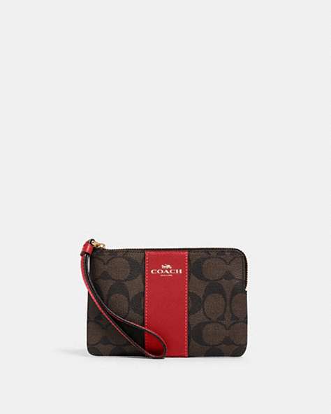 COACH®,CORNER ZIP WRISTLET IN SIGNATURE CANVAS,pvc,Mini,Gold/Brown 1941 Red,Front View