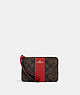 COACH®,CORNER ZIP WRISTLET IN SIGNATURE CANVAS,pvc,Mini,Gold/Brown 1941 Red,Front View
