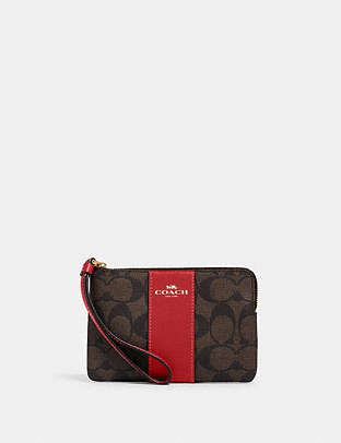 COACH®,CORNER ZIP WRISTLET IN SIGNATURE CANVAS,pvc,Gold/Brown 1941 Red,Front View