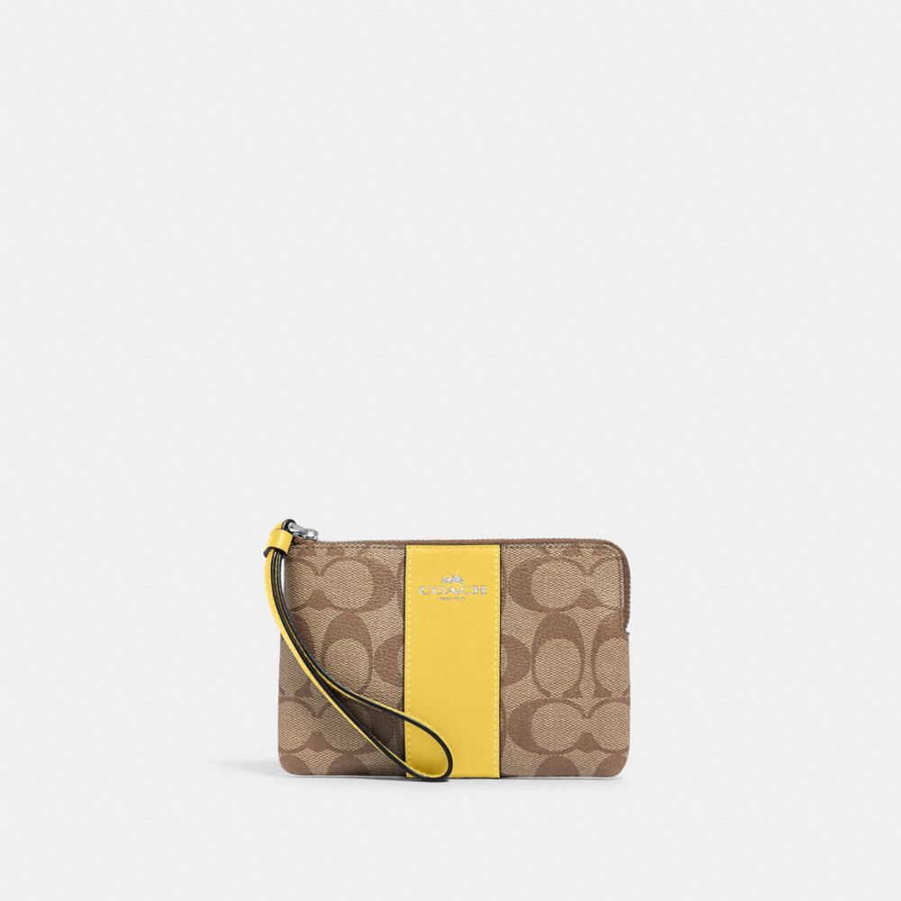 Corner Zip Wristlet In Signature Canvas