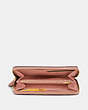 COACH®,ACCORDION ZIP WALLET,Pebbled Leather,Mini,Gold/Light Peach,Inside View,Top View