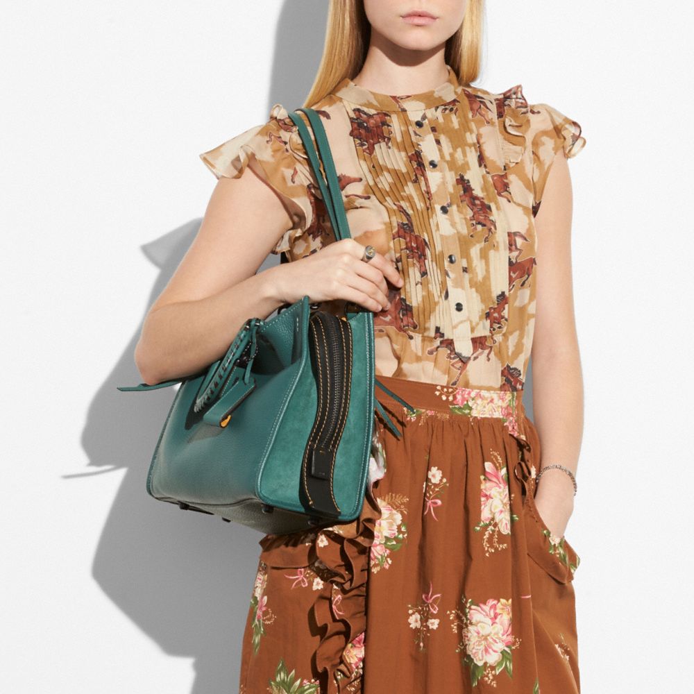 Coach rogue best sale with whipstitch handle