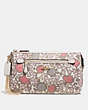 COACH®,NOLITA WRISTLET 24 IN YANKEE FLORAL PRINT COATED CANAVAS,pvc,Light Gold/Beechwood Yankee Floral,Front View