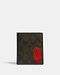 COACH®,NORTH/SOUTH SLIM BILL WALLET IN SIGNATURE CANVAS WITH COACH PATCH,Gunmetal/Olive,Front View