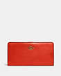 COACH®,SKINNY WALLET,Calf Leather,Mini,Brass/Red Orange,Front View