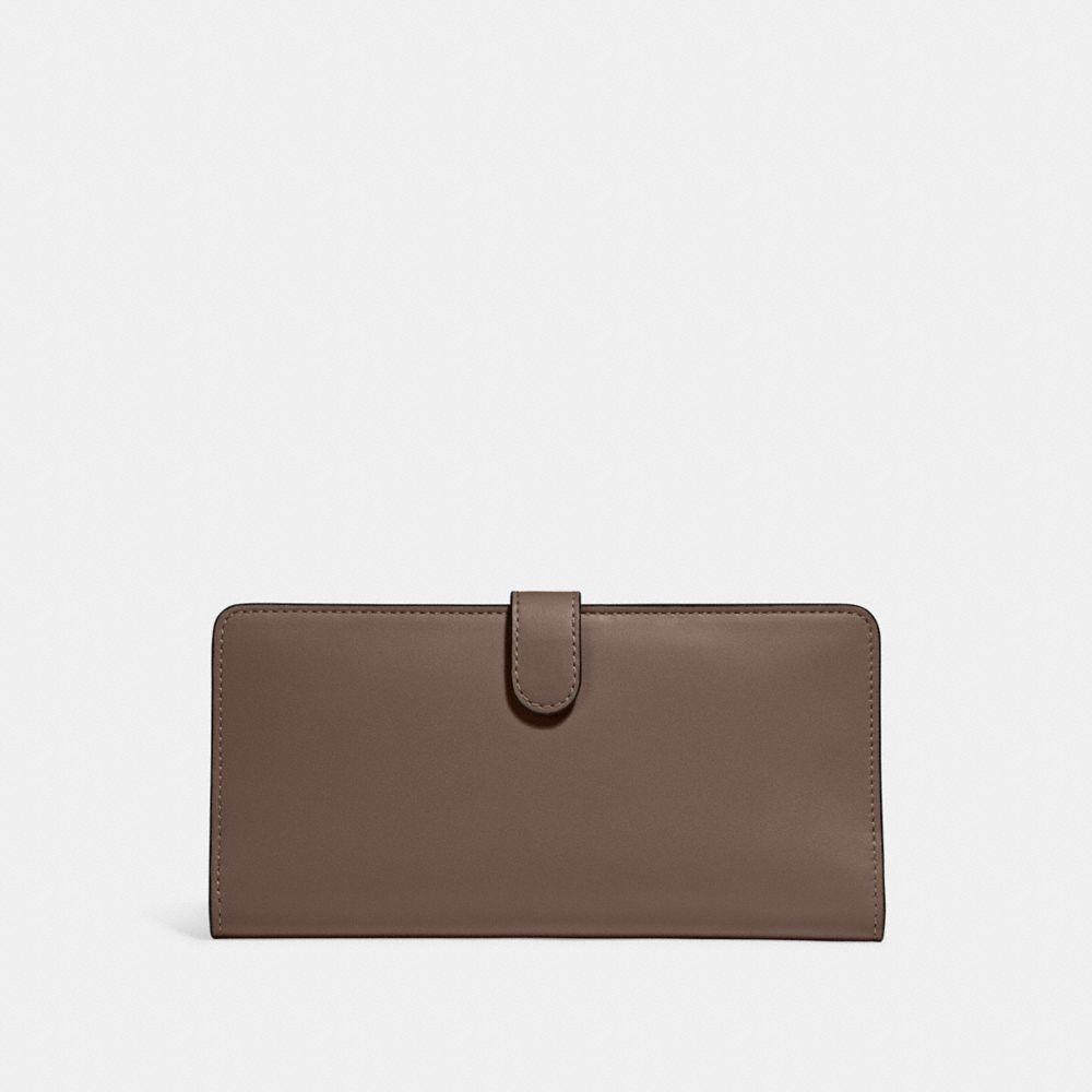 Skinny coach wallet new arrivals