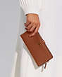 COACH®,SKINNY WALLET,Calf Leather,Mini,1941 Saddle/Light Gold,Detail View