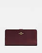 COACH®,SKINNY WALLET,Calf Leather,Mini,Light Gold/Oxblood,Front View