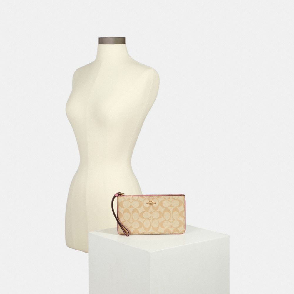 Large Wristlet In Signature Canvas