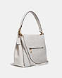 COACH®,SHAY SHOULDER BAG IN SIGNATURE CANVAS,Coated Canvas,Large,Brass/Chalk Chalk,Angle View