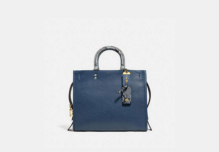 COACH®,ROGUE IN COLORBLOCK WITH SNAKESKIN DETAIL,Pebble Leather/Exotic,Medium,Brass/Dark Denim,Front View