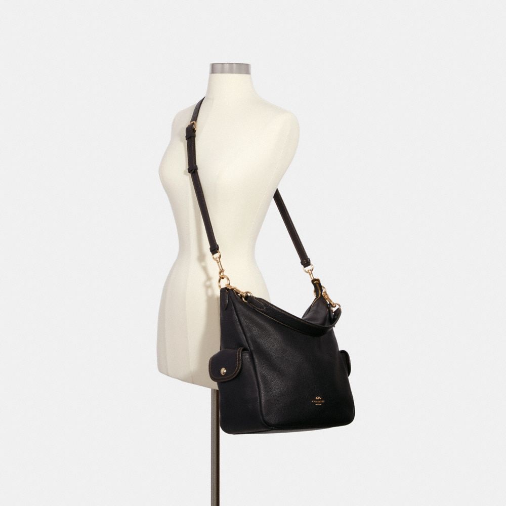 Penny crossbody coach online outlet