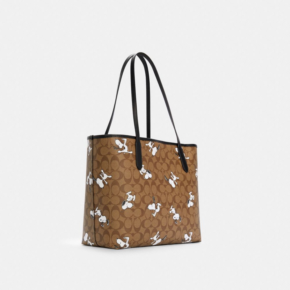 COACH®,Coach X Peanuts City Tote Bag In Signature Canvas With Snoopy Print,,Angle View