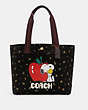 COACH®,COACH X PEANUTS TOTE WITH SNOOPY,Gold/Black Multi,Front View