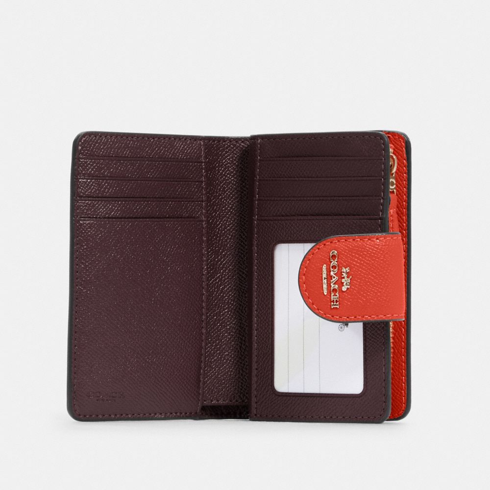 Coach medium best sale corner wallet