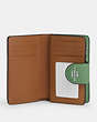 COACH®,MEDIUM CORNER ZIP WALLET,Leather,Mini,Silver/Soft Green,Inside View,Top View