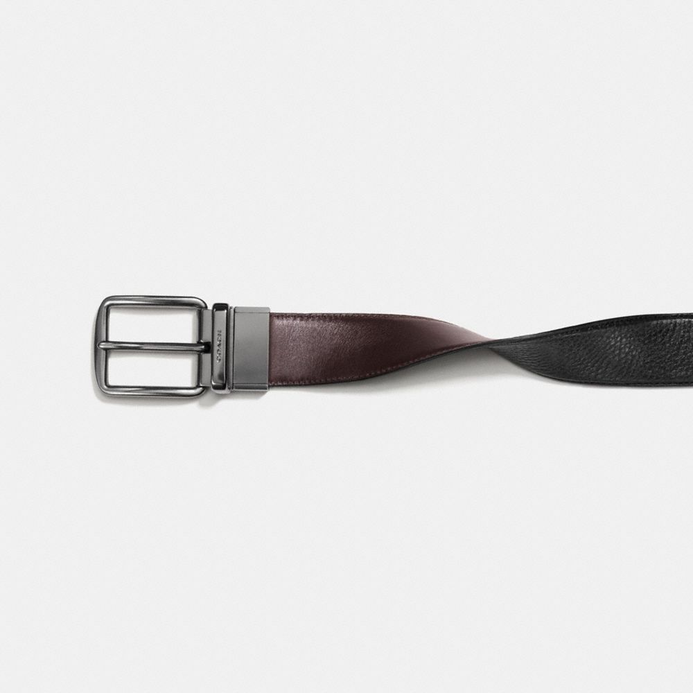 COACH®,HARNESS BUCKLE CUT-TO-SIZE REVERSIBLE BELT, 38MM,Leather,Black/Mahogany,Angle View