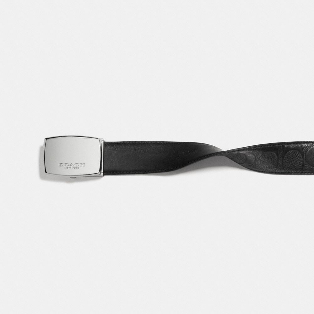 COACH®,Dress Plaque Cut To Size Reversible Belt In Signature Leather,,Angle View