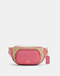COACH®,COURT BELT BAG IN SIGNATURE CANVAS,Leather,Mini,Gold/Light Khaki/Confetti Pink,Front View