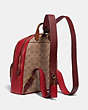 COACH®,CARRIE BACKPACK 23 IN COLORBLOCK SIGNATURE CANVAS,pvc,Medium,Brass/Tan Red Apple Multi,Angle View