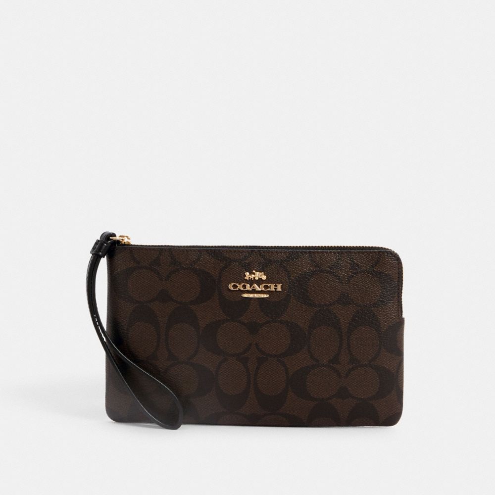 Coach Corner Zip Wristlet In Signature Canvas With Hula Print