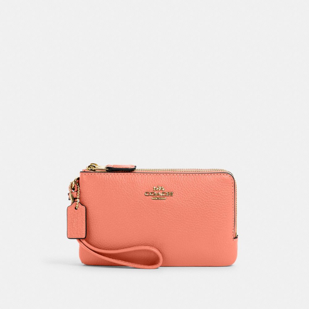 Coach wristlet Larger than your average wristlet, and in excellent