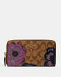 COACH®,ACCORDION ZIP WALLET IN SIGNATURE CANVAS WITH KAFFE FASSETT PRINT,pvc,Gold/Khaki Purple Multi,Front View