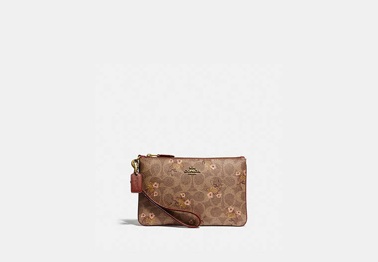 Small Wristlet In Signature Canvas With Floral Bow Print