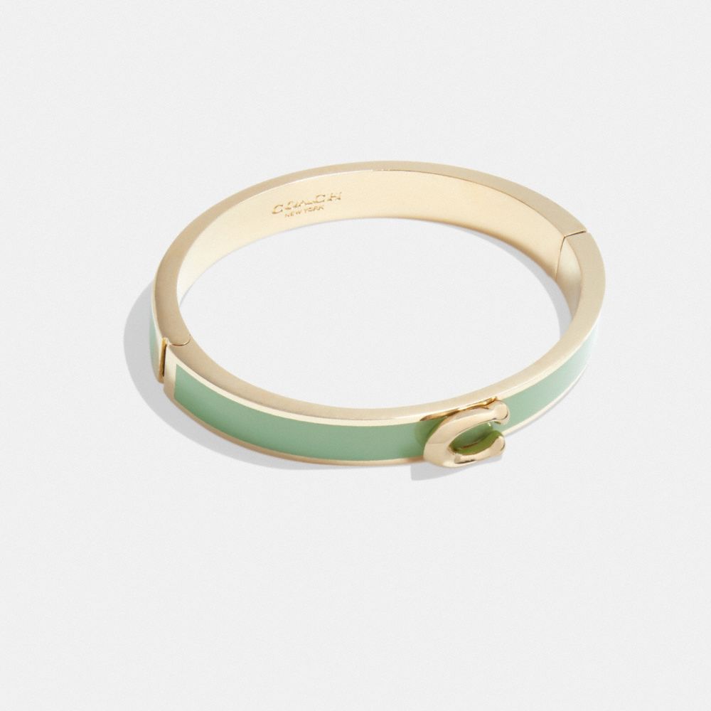 COACH®,SIGNATURE PUSH HINGED BANGLE,Gold/Light Pistachio,Front View