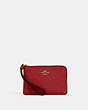 COACH®,CORNER ZIP WRISTLET IN SIGNATURE LEATHER,Leather,Mini,Gold/1941 Red,Front View