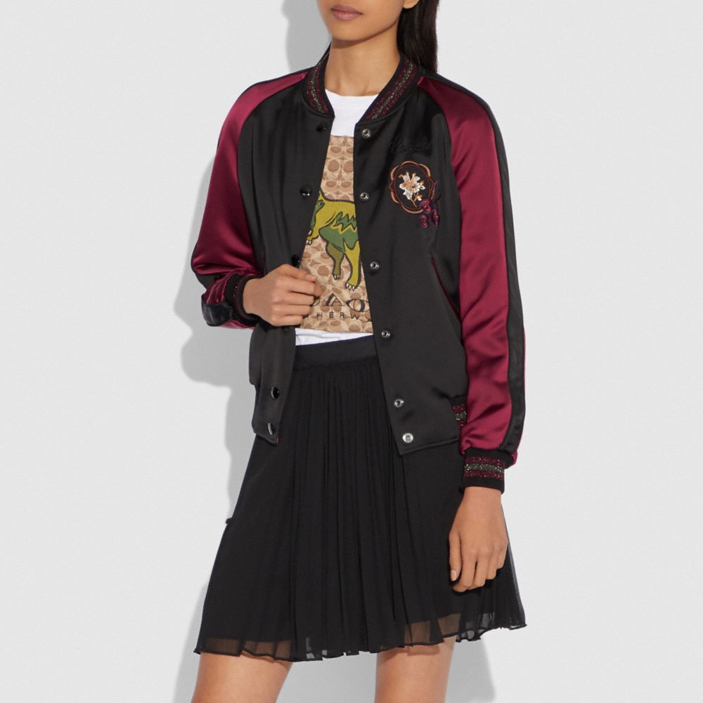 COACH OUTLET®  Reversible Signature Souvenir Jacket With Floral Embroidery