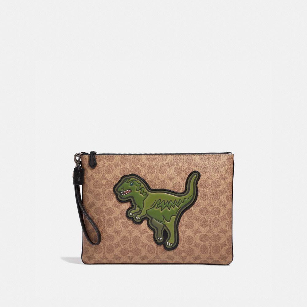 Coach purse best sale with dinosaur