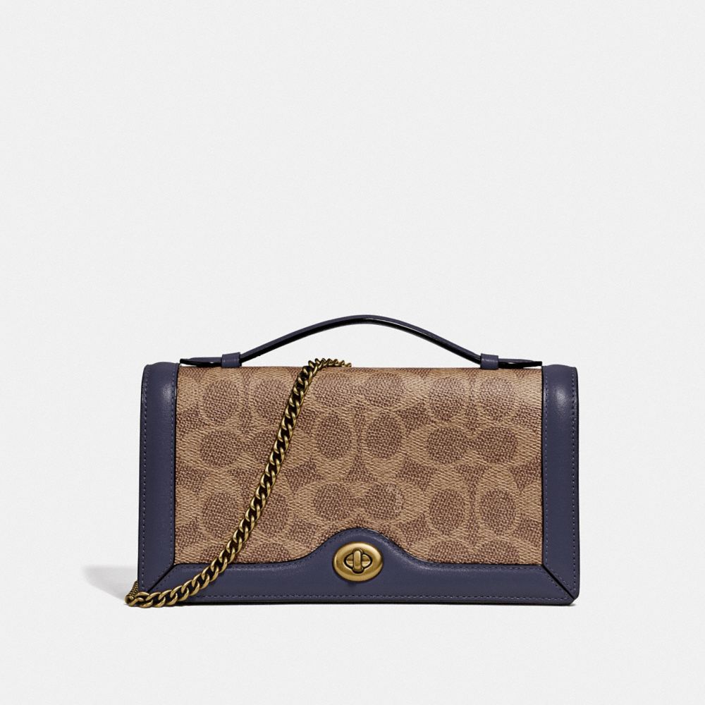 Coach clutch online signature