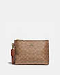 COACH®,CHARLIE POUCH IN COLORBLOCK SIGNATURE CANVAS,Coated Canvas,Small,Brass/Tan/Rust,Front View