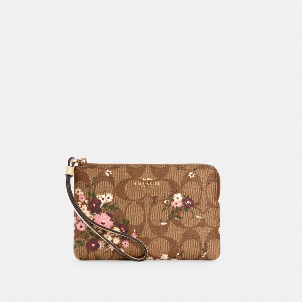 Coach wristlet best sale signature canvas