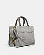 COACH®,COACH X JEAN-MICHEL BASQUIAT ROGUE 25 WITH SNAKESKIN DETAIL,Leather,Medium,Brass/Cinder,Angle View