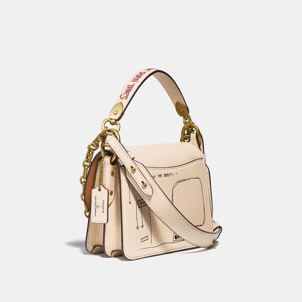 COACH®,COACH X JEAN-MICHEL BASQUIAT BEAT SHOULDER BAG 18,Leather,Small,Brass/Ivory,Angle View