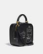 COACH®,COACH X JEAN-MICHEL BASQUIAT SQUARE BAG,Leather,Small,Brass/Black,Angle View