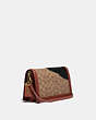 COACH®,DISNEY X COACH SIGNATURE RILEY WITH EMBELLISHED PETER PAN,pvc,Small,Brass/Tan/Rust,Angle View